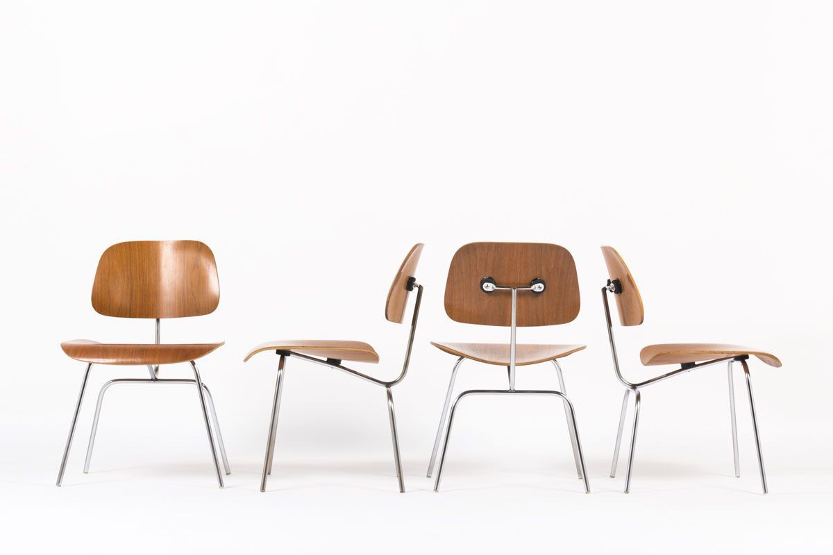 iconic chairs of american design in walnut and chrome