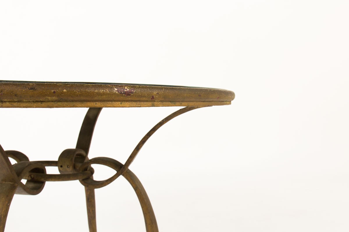 Rene Prou round coffee table in patinated gold metal and screen-printed glass top 1930