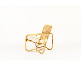 Armchair in rattan and beige cotton fabric 1950