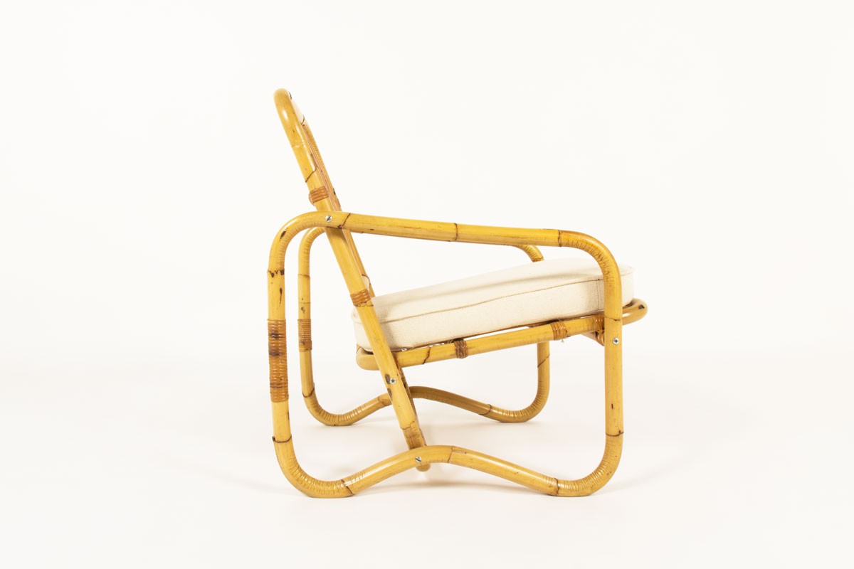 Armchair in rattan and beige cotton fabric 1950
