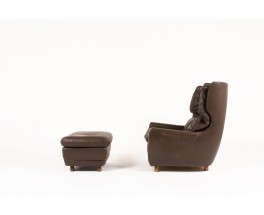 Armchair and footrest in brown leather and wood feet 1970