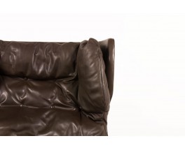 Armchair and footrest in brown leather and wood feet 1970