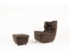 Armchair and footrest in brown leather and wood feet 1970