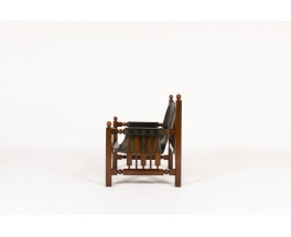 Fauteuil en chêne et skaï noir design espagnol 1950