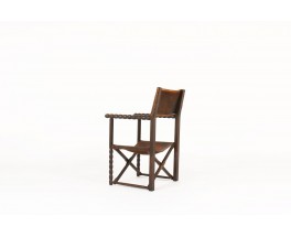 Fauteuil en chêne foncé et cuir marron 1950