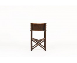 Armchair in dark wood with brown leather 1950