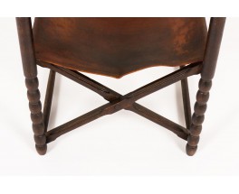 Fauteuil en chêne foncé et cuir marron 1950