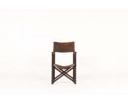 Armchair in dark wood with brown leather 1950