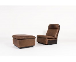 Armchair and footrest in leather edition De Sède 1970