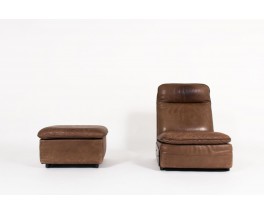 Armchair and footrest in leather edition De Sède 1970