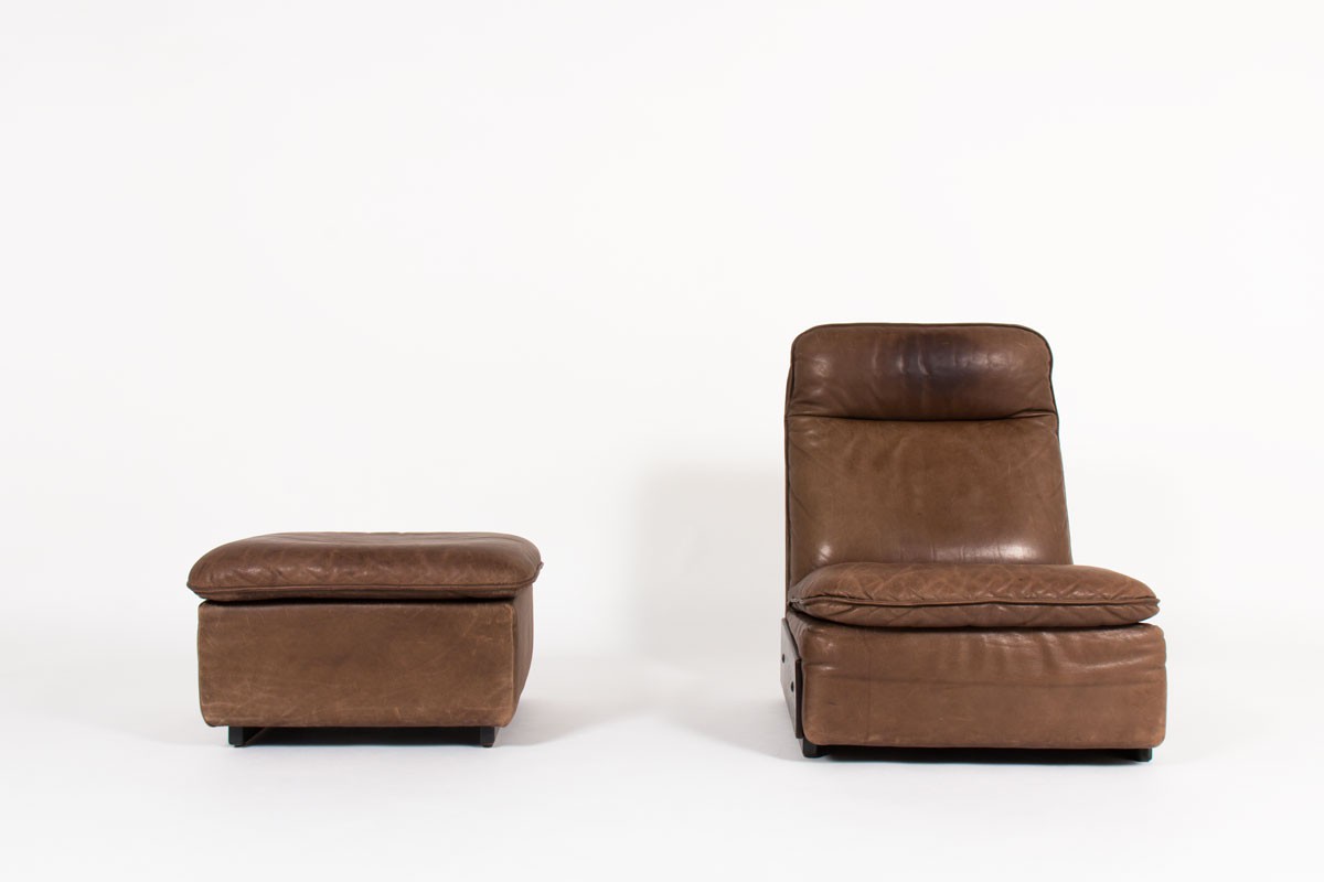 Armchair and footrest in leather edition De Sède 1970