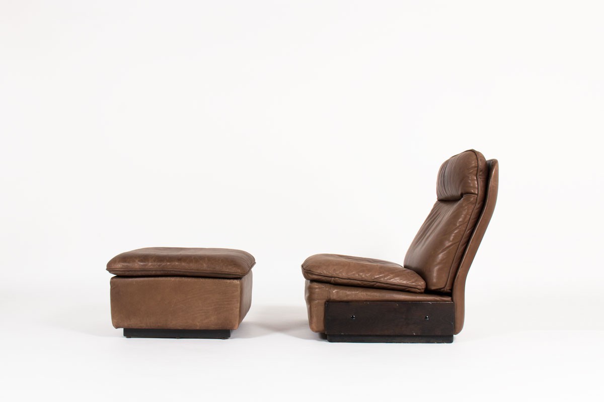 Armchair and footrest in leather edition De Sède 1970