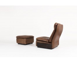 Armchair and footrest in leather edition De Sède 1970