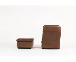 Armchair and footrest in leather edition De Sède 1970