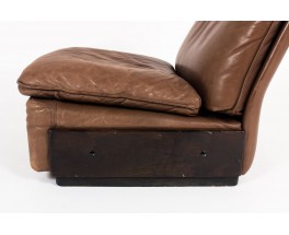 Armchair and footrest in leather edition De Sède 1970