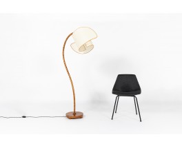 Floor lamp in wood with curved beige lampshade 1950