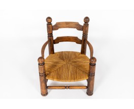 Fauteuil Charles Dudouyt chêne et paille 1930