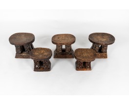 Monoxyl stools in black carved wood African design 1950 set of 5