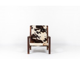 Armchair in mahogany and cowhide seat 1950