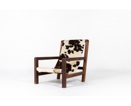 Fauteuil en acajou et assise peau de vache 1950