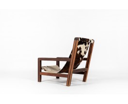 Armchair in mahogany and cowhide seat 1950