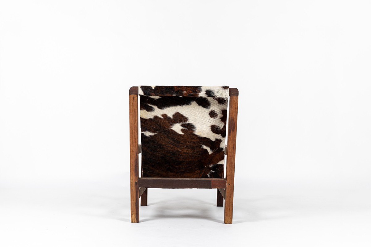 Fauteuil en acajou et assise peau de vache 1950