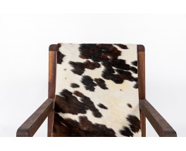 Armchair in mahogany and cowhide seat 1950