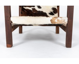 Armchair in mahogany and cowhide seat 1950