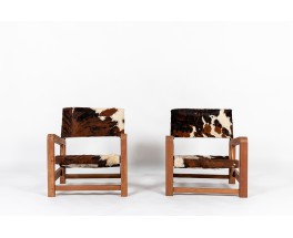 Fauteuils en acajou et peau de vache 1950 set de 2