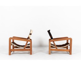 Fauteuils en acajou et peau de vache 1950 set de 2