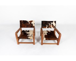 Fauteuils en acajou et peau de vache 1950 set de 2