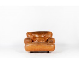 Armchair in leather and rosewood 1970