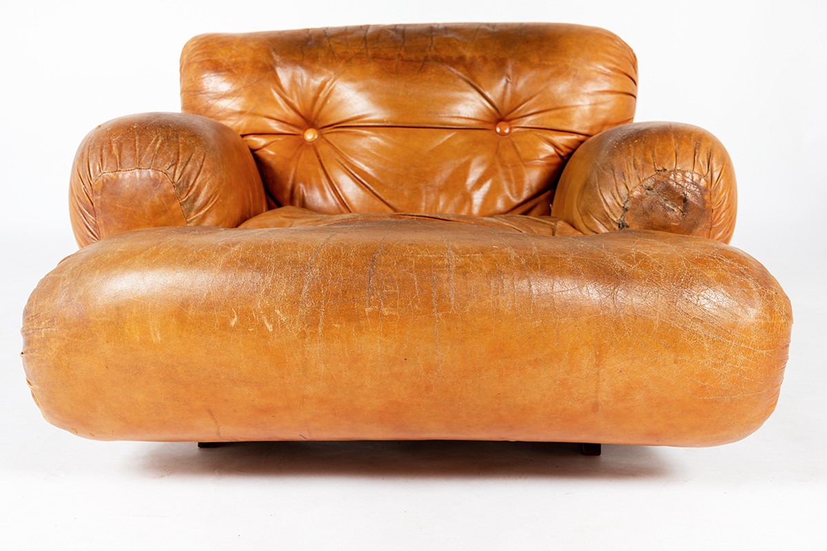 Armchair in leather and rosewood 1970