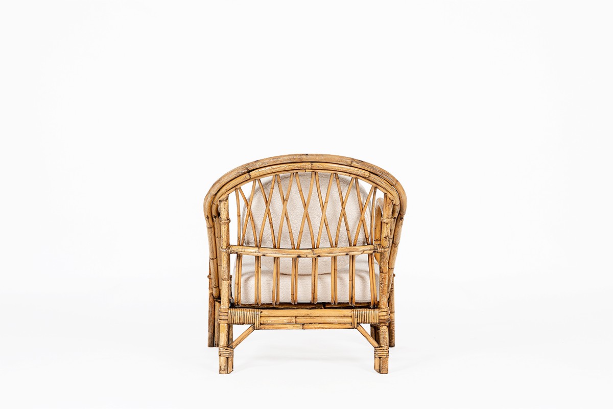 Audoux Minet armchair in rattan and linen cushions 1950