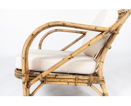 Audoux Minet armchair in rattan and linen cushions 1950