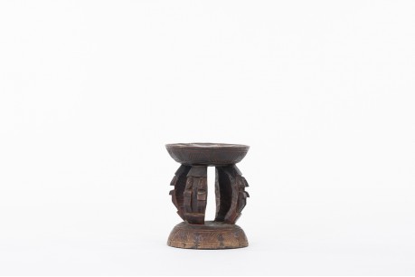 Round stool in wood model Dogon African design 1950