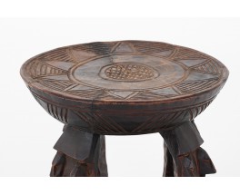 Round stool in wood model Dogon African design 1950