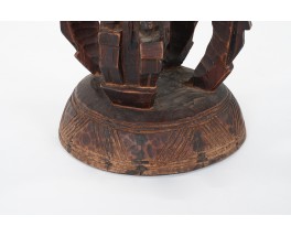 Round stool in wood model Dogon African design 1950