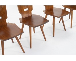 Chaises en acajou pieds compas et dossier taillé à la gouge 1960 set de 4