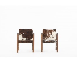 Armchairs in oak and cow skin reconstruction design 1950