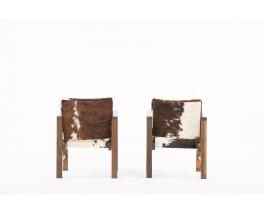 Armchairs in oak and cow skin reconstruction design 1950