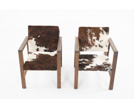 Armchairs in oak and cow skin reconstruction design 1950