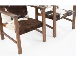 Armchairs in oak and cow skin reconstruction design 1950