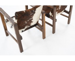 Armchairs in oak and cow skin reconstruction design 1950