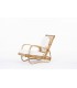 Audoux Minet armchair in rattan with beige terry cushions 1950