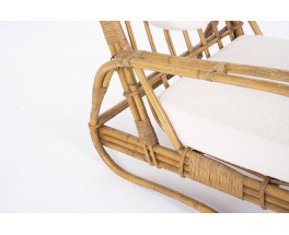 Audoux Minet armchair in rattan with beige terry cushions 1950